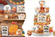 A beautifully styled fall tiered tray with pumpkins, mini signs, and rustic florals