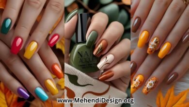 Most popular fall nail colors featured on a manicured hand with deep green, burnt orange, and creamy neutrals, styled with subtle abstract swirl designs