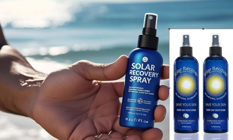 Solar Recovery Spray Reviews and Ingredients A person's hand holding a blue bottle of Solar Recovery Spray, with a blurred background of a sunny beach and calm ocean waves