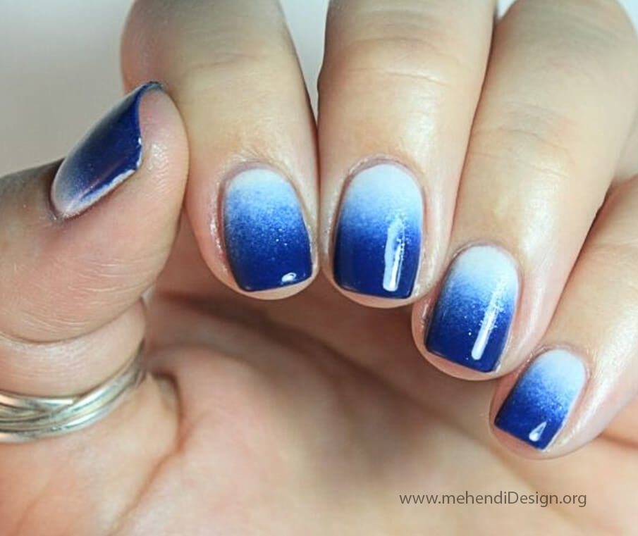 Image of A beautiful blue gradient ombre nail design for Labor Day A beautiful blue gradient ombre nail design for Labor Day