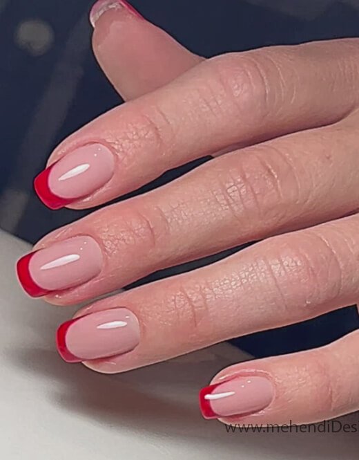Image of A modern outline French manicure in red for Labor Day A modern outline French manicure in red for Labor Day