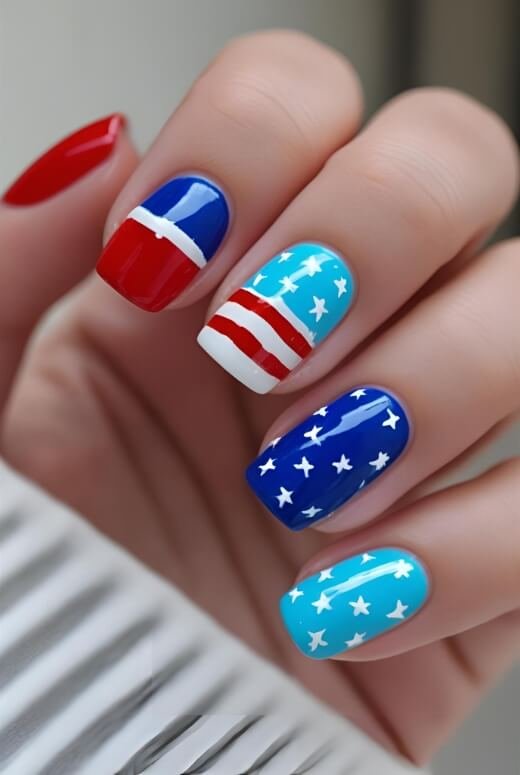 Image of A simple and classic Labor Day manicure with alternating red white and blue nails A simple and classic Labor Day manicure with alternating red, white, and blue nails