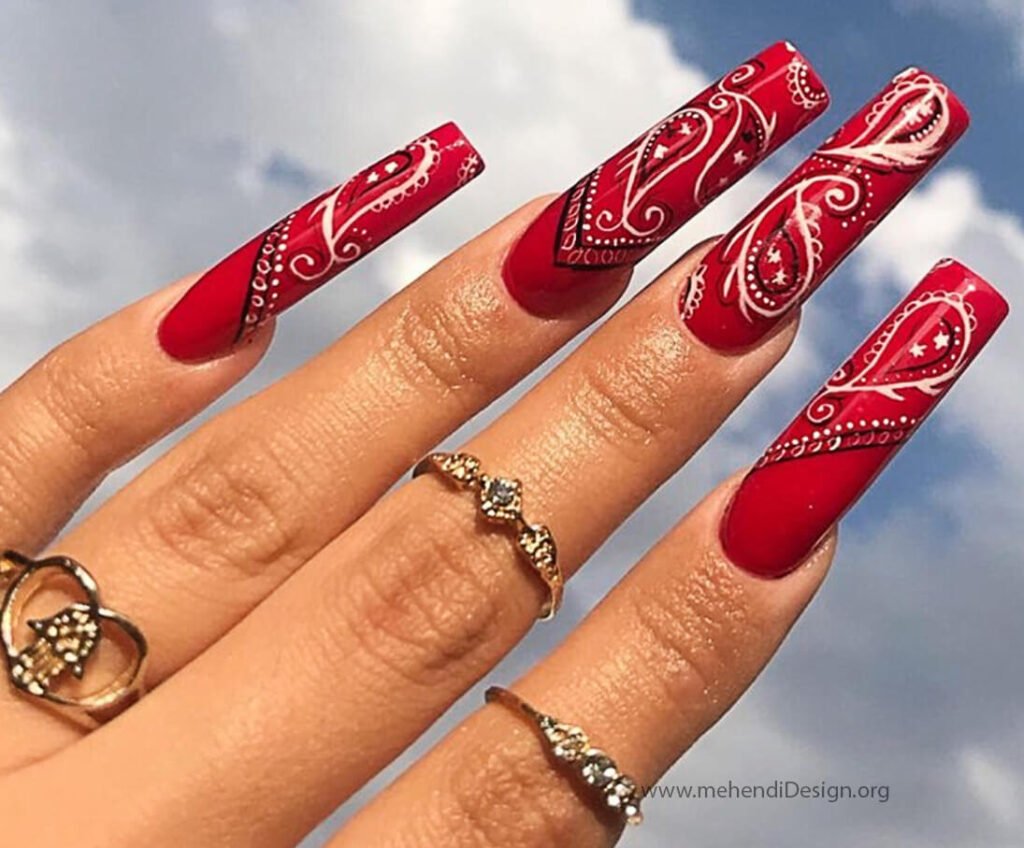 Image of A unique and intricate bandana print nail art design for Labor Day A unique and intricate bandana print nail art design for Labor Day