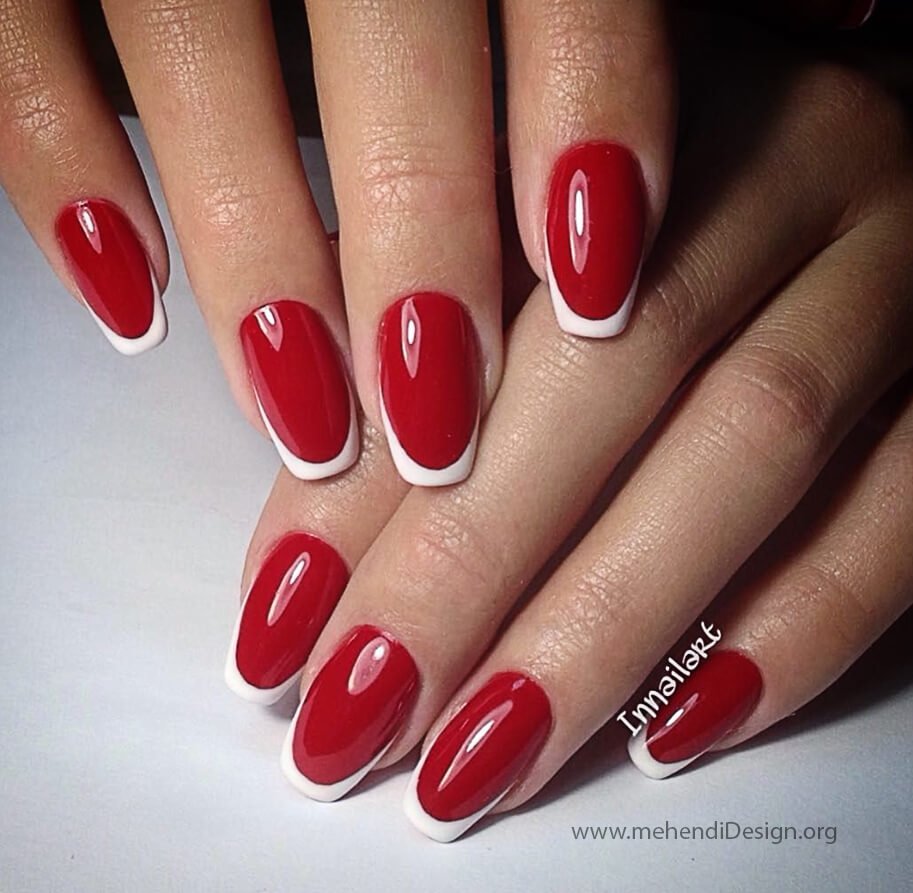 Image of An understated and chic Labor Day manicure with red white color An understated and chic Labor Day manicure with red white color