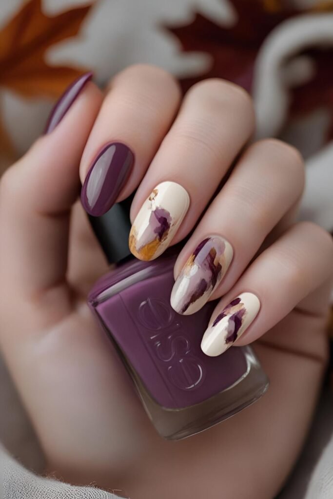 Elegant Fall Inspired Nail Art with Creamy Neutrals and Abstract Plum