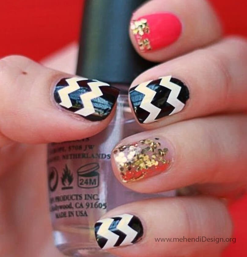 Image of Graphic red white and black chevron striped nail art Graphic red, white, and black chevron striped nail art