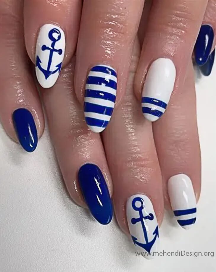 Image of Modern Labor Day nails featuring a navy blue and white color block design Modern Labor Day nails featuring a navy blue and white color block design