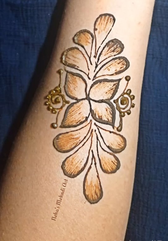 Image of Stunning Forearm Henna tattoo for fall season Stunning Forearm Henna tattoo for fall season