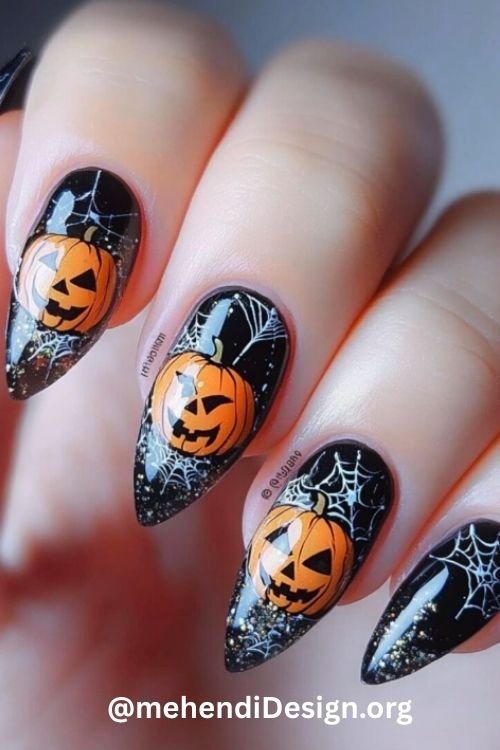 Image of Glow in the dark Jack O Lantern halloween acrylic nails designs perfect for a spooky night Glow-in-the-dark Jack-O'-Lantern halloween acrylic nails designs, perfect for a spooky night