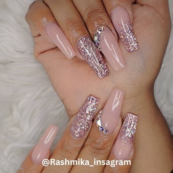 Image of Long glitter coffin acrylics a glamorous and eye catching halloween nail design Long glitter coffin acrylics, a glamorous and eye catching halloween nail design