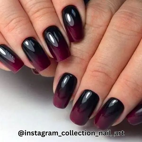 Image of Stunning blood moon ombre design a dramatic and elegant halloween acrylic nail design Stunning blood moon ombre design, a dramatic and elegant halloween acrylic nail design